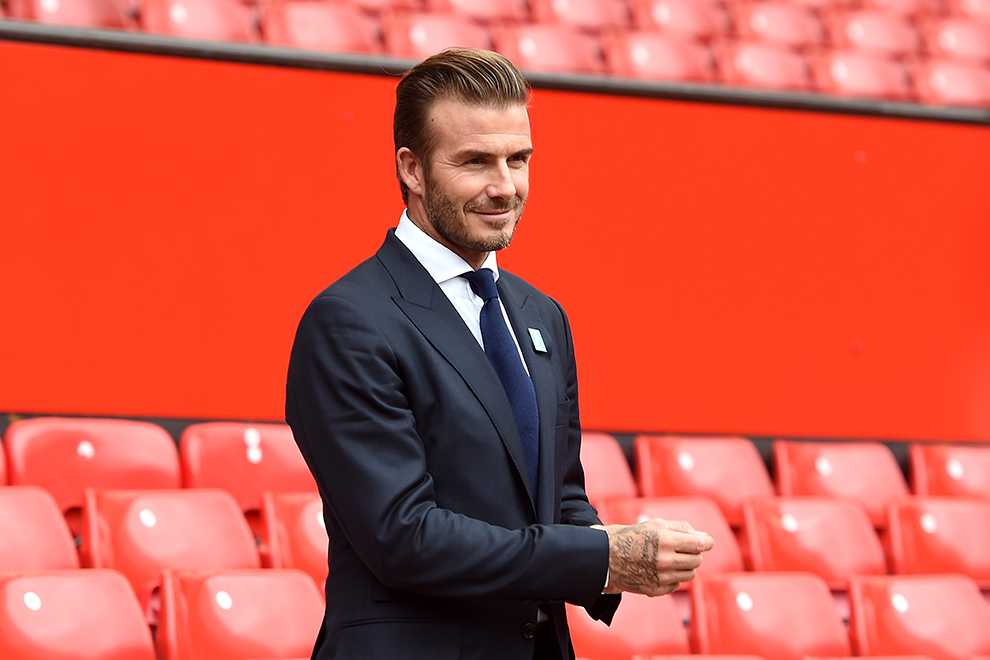 David Beckham stands on the Old Trafford pitch, to launch the upcoming UNICEF Match for Children, during a photocall at Old Trafford, Manchester.