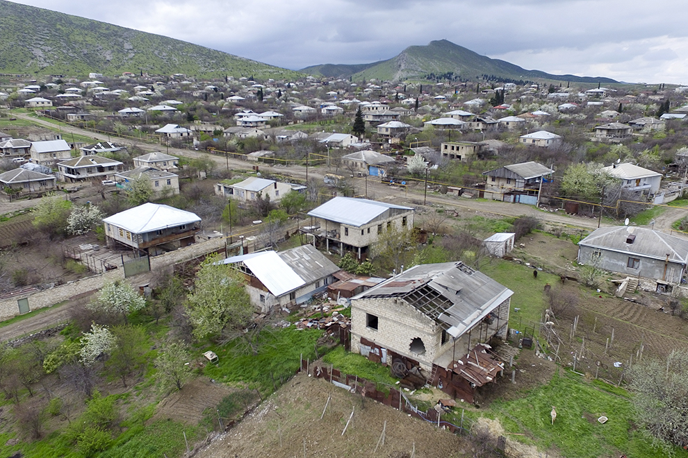 This aerial view shows destroyed houses during the fighting at Martakert province in the separatist region of Nagorno-Karabakh, Azerbaijan, Monday, April 4, 2016. Fighting raged Monday around Nagorno-Karabakh, with Azerbaijan saying it lost three of its troops in the separatist region while inflicting heavy casualties on Armenian forces and the Armenian president warning that the hostilities could slide into a full-scale war. (Davit Abrahamyan, PAN Photo via AP)