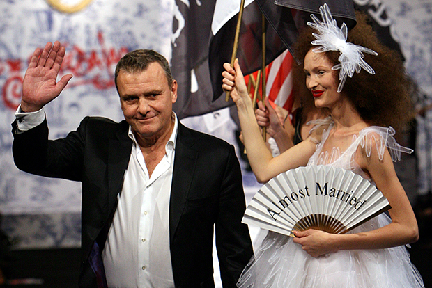 French designer Jean-Charles de Castelbajac appears with his models at the end of his Spring/Summer 2007 ready-to-wear fashion show in Paris October 6, 2006. REUTERS/Philippe Wojazer (FRANCE) - RTR1I2J7