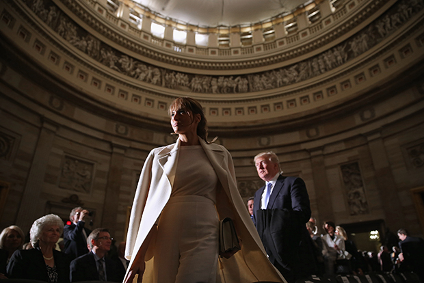 WASHINGTON, DC - MARCH 24: Real estate mogul and billionaire Donald Trump (R) and his wife Melania Knauss-Trump attend Golf legend Jack Nicklaus' Congressional Gold Medal ceremony in the U.S. Capitol Rotunda March 24, 2015 in Washington, DC. Trump announed on March 18 that he has launched a presidential exploratory committee. (Photo by Chip Somodevilla/Getty Images)