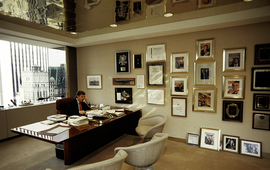 Donald Trump, real estate mogul, entrepreneur, and billionare spends most of his day attending board meetings in which he manages the construction of his buildings in his offices on August 1987 in New York City.