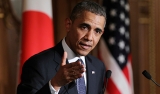 Обама выступил за сохранение санкций против России