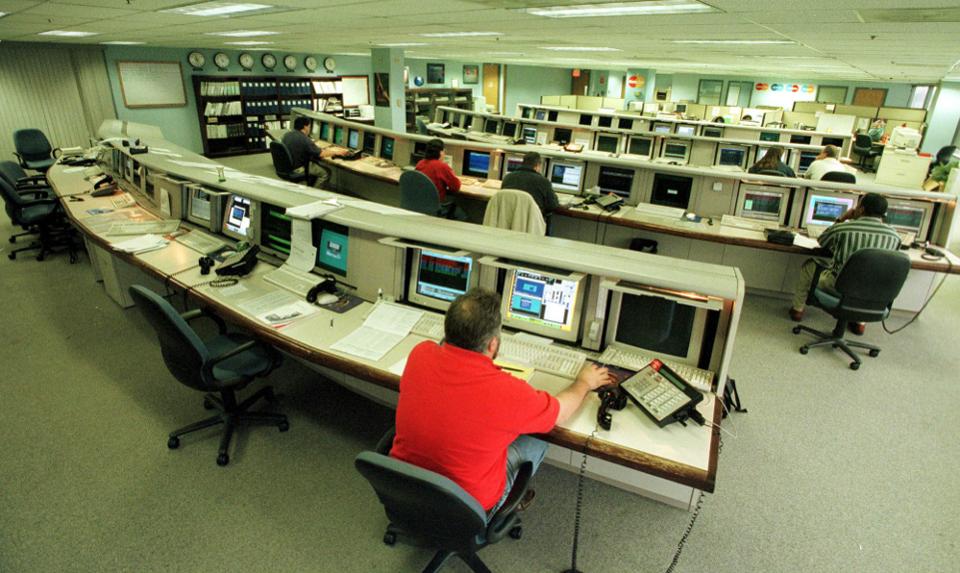A skeleton crew monitors the National Command Center for Mastercard on January 3, 2000. The center processed 18 million transactions totalling $1.8 billion for the busy New Year’s Eve weekend. No Y2K problems were encountered.