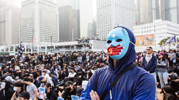 Митинг, устроенный в Гонконге в декабре 2022 года в знак солидарности с уйгурами в Синьцзяне. (Фото Willie Siau / SOPA Images / LightRocket via Getty Images)