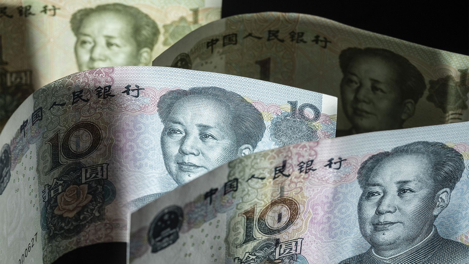 200 000 юаней. Китайский юань. Китайская валюта. Облигации в юанях. Юань фото.