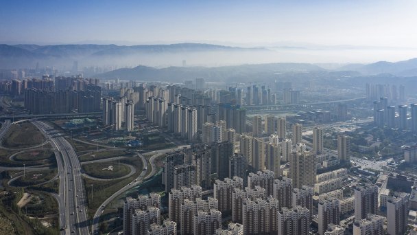 В 2020 году объем продаж жилья в Китае превысил 1,76 млрд кв. м. Для сравнения: в России вводится порядка 90 млн кв. м жилья в год. (Фото Getty Images)