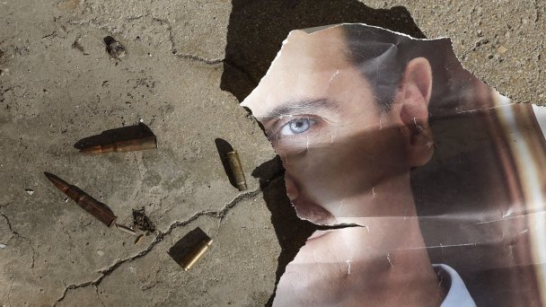 Портрет Башара Асада (Фото Antonio Pedro Santos / EPA)