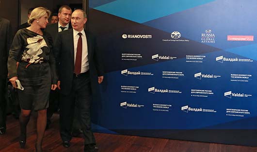 Бывший главный редактор РИА Новости Светлана Миронюк и президент России Владимир Путин